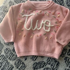 Adorable Pink Knit Sweater with Embroidered Design